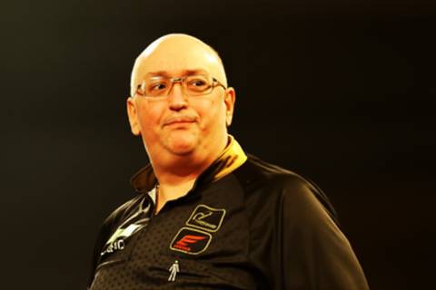 GILDING BATTLES INJURY AND DEFICIT TO FIRE 106 AVERAGE AT POLAND DARTS OPEN